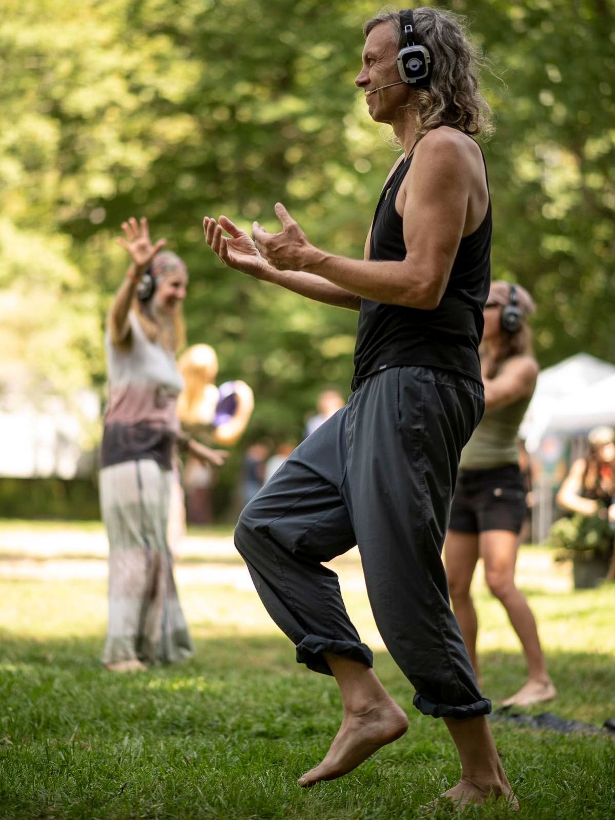 Matt leading an outdoor headphone dance session